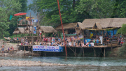 Backpackers Tubing on the Nam Song river in Vang Vieng, Laos - Mar 2011