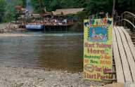Backpackers Tubing on the Nam Song river in Vang Vieng, Laos - Mar 2011