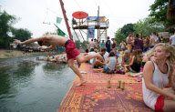 Backpackers Tubing on the Nam Song river in Vang Vieng, Laos - Mar 2011