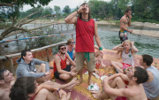 Backpackers Tubing on the Nam Song river in Vang Vieng, Laos - Mar 2011