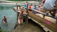 Backpackers Tubing on the Nam Song river in Vang Vieng, Laos - Mar 2011