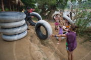 Backpackers Tubing on the Nam Song river in Vang Vieng, Laos - Mar 2011