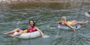Backpackers Tubing on the Nam Song river in Vang Vieng, Laos - Mar 2011