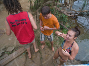 Backpackers Tubing on the Nam Song river in Vang Vieng, Laos - Mar 2011