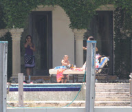 Alicia Keys enjoys some pool fun with her son Egypt and family. Alicia also got cuddles and kisses as she took some time out ahead of the Zo's Summer Groove this weekend
