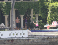 Alicia Keys enjoys some pool fun with her son Egypt and family. Alicia also got cuddles and kisses as she took some time out ahead of the Zo's Summer Groove this weekend
