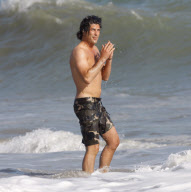 Brandon Davis takes a dip in the Pacific Ocean