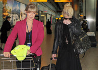 AN EMOTIONAL KELLY OSBOURNE AT HEATHROW
