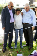 The parents of Amy Winehouse view floral tributes outside No. 30 Camden Square, London, Britain - 25 Jul 2011