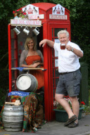 Village opens smallest pub in world in red phone box, Shepreth, Cambridgeshire, Britain - 10 Jul 2011