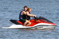 **NO BLOG USE**  *EXCLUSIVE* Miley Cyrus and Liam Hemsworth reunite for a Sunday Lake Affair **NO BLOG USE**