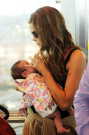 Denise Richards Is on Mom Duty at JFK