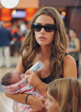 Denise Richards Is on Mom Duty at JFK