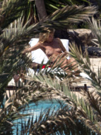 Heidi Klum enjoy a day at the swimming pool in sunny Ibiza