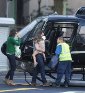 Tom Cruise, Katie Holmes and Suri Cruise Arrive at the Downtown Manhattan Heliport