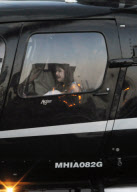 Katie Holmes and Daughter Suri Cruise at the Heliport