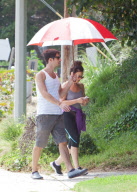 Fran Drescher Takes a Walk Under an Umbrella