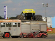 Stunt driver's attempt to drive monster truck over fire engine backfires at Santa Pod Raceway, Northamptonshire, Britain - 21 Aug 2011