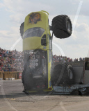 Stunt driver's attempt to drive monster truck over fire engine backfires at Santa Pod Raceway, Northamptonshire, Britain - 21 Aug 2011