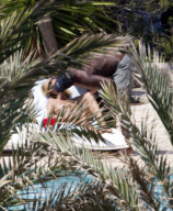 Heidi Klum enjoy a day at the swimming pool in sunny Ibiza