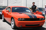 Patrick Schwarzenegger Gets into his Dodge Challenger