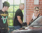 Jennifer Aniston her lollipop and Justin Theroux leaving medical building