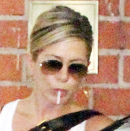 Jennifer Aniston her lollipop and Justin Theroux leaving medical building