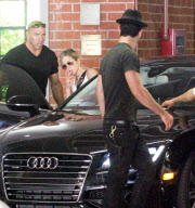 Jennifer Aniston her lollipop and Justin Theroux leaving medical building