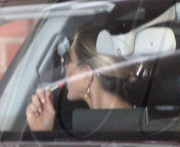 Jennifer Aniston her lollipop and Justin Theroux leaving medical building