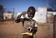 SOUTH AFRICA-SLUM-CHILDREN-TOY