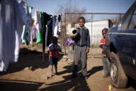 SOUTH AFRICA-SLUM-CHILDREN-TOY