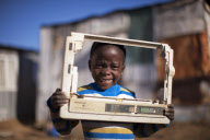 SOUTH AFRICA-SLUM-CHILDREN-TOY