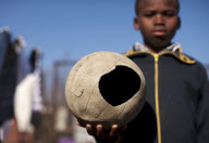 SOUTH AFRICA-SLUM-CHILDREN-TOY
