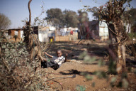 SOUTH AFRICA-SLUM-CHILDREN-TOY