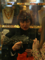 - Swiss President Micheline Calmy-Rey during the official visit to Lithuania buys Russian Matrioska.