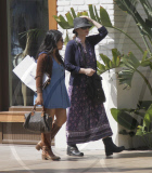 Winona Ryder with her assistant goes shopping