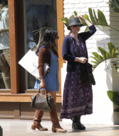Winona Ryder with her assistant goes shopping