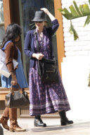 Winona Ryder with her assistant goes shopping