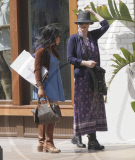 Winona Ryder with her assistant goes shopping