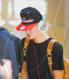 Justin Bieber Arrives with his Head Down