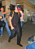 Justin Bieber Arrives with his Head Down