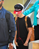 Justin Bieber Arrives with his Head Down