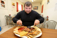 Man becomes first person to eat world's biggest English breakfast, Corby, Northamptonshire, Britain - 12 Sep 2011