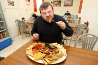Man becomes first person to eat world's biggest English breakfast, Corby, Northamptonshire, Britain - 12 Sep 2011