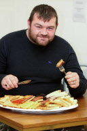 Man becomes first person to eat world's biggest English breakfast, Corby, Northamptonshire, Britain - 12 Sep 2011