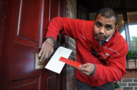 Postmen to be issued with 'Posting Pegs' to avoid getting their fingers bitten by dogs, Britain - 17 Sep 2011