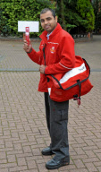 Postmen to be issued with 'Posting Pegs' to avoid getting their fingers bitten by dogs, Britain - 17 Sep 2011