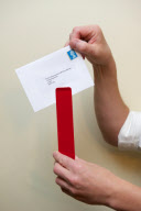 Postmen to be issued with 'Posting Pegs' to avoid getting their fingers bitten by dogs, Britain - 17 Sep 2011