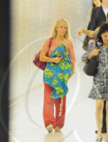Kendra Wilkinson Hides Under a Frog Blanket