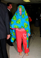 Kendra Wilkinson Hides Under a Frog Blanket